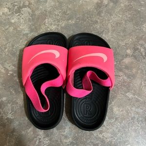 Size 7 toddler Nike slip ons.